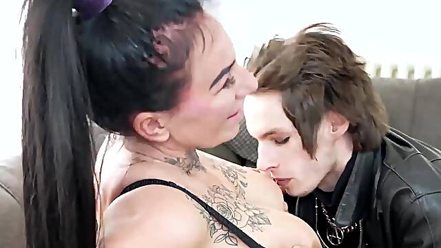 Inked Mature With Big Boobs Gives Blowjob To Emo Stud