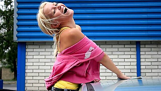 Beautiful blonde chick Sophie Moone is cleaning her car in a hot way