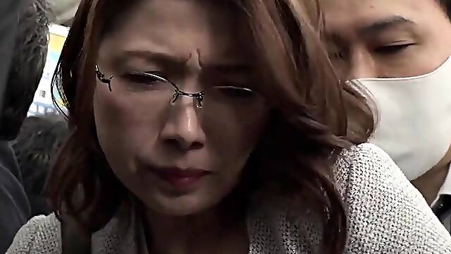 Japanese amateur MILF sucking on dick