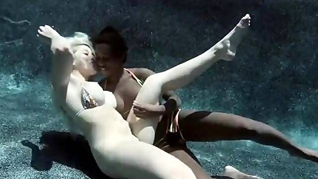 Underwater girl on girl action