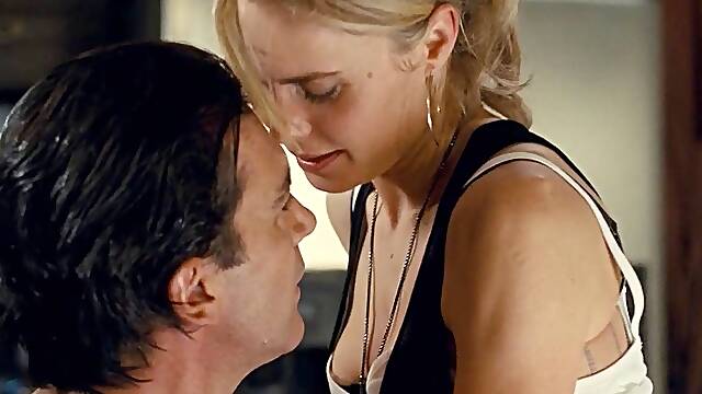 Experience the seductive allure of Radha Mitchell, a stunning babe with a body so thick, itll drive you wild. Prepare to be captivated.