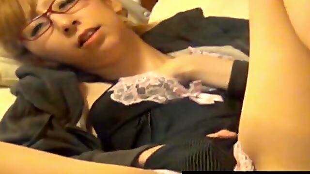 Japanese beauty indulges in clit and pussy play